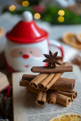 On the table there is New Year's tea 2026, coffee, gingerbread and pine cone cookies.