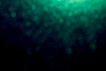Background of abstract green glitter lights.