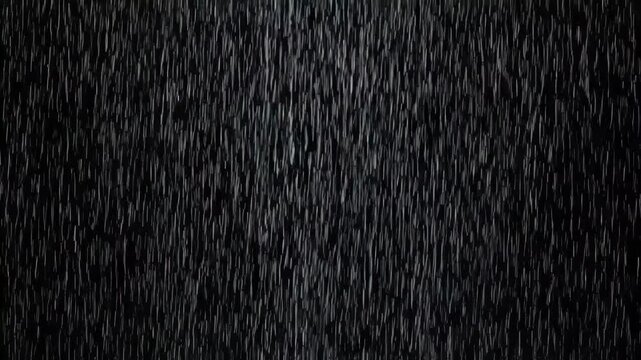 Heavy Rain Loop Overlay - This video shows heavy rain falling against a black background. This could be used as a VFX asset or a looping video overlay.