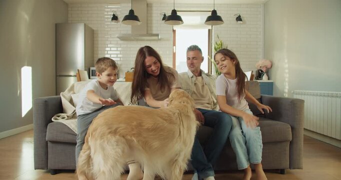 Cozy living room moment with white family and golden retriever