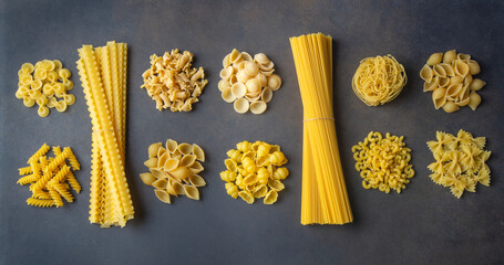 Composition with different tasty uncooked pasta - Italian pasta wallpaper, different types and shapes of pasta layout