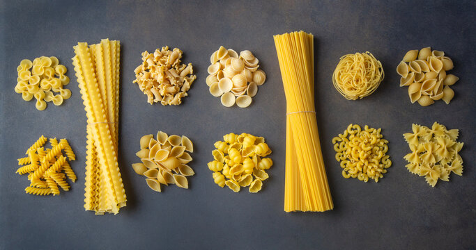 Composition with different tasty uncooked pasta - Italian pasta wallpaper, different types and shapes of pasta layout - Powered by Adobe