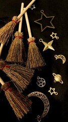 Witch brooms and magical symbols on black background occult charms, moon, stars and pentagram for mystical rituals and witchcraft