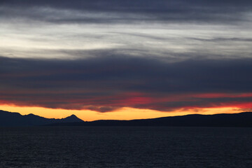Colorful sunset or sunrise sky over the sea.
