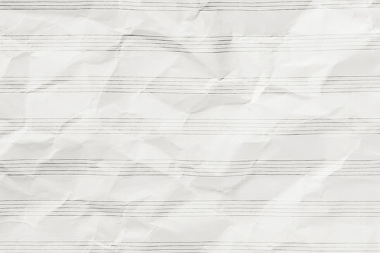 Cloud Dancer color of year 2026. Blank musical stave from music notebook, white lined crumpled paper