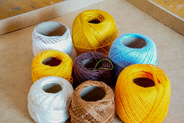 colorful wool rolls in a box