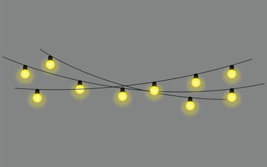 Obraz premium String of yellow glowing light bulbs decor hanging on grey smooth backdrop