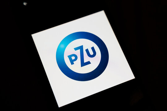 Warsaw, Poland - Dec 4, 2025: PZU logo displayed on a smartphone screen. The design features blue and white colors, emphasizing insurance and financial sectors.