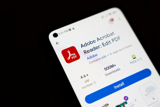 Warsaw, Poland - Dec 4, 2025: Close-up of a smartphone screen displaying Adobe Acrobat Reader application for editing PDF files, emphasizing ease of use and functionality.