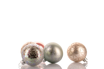 Glass Christmas balls isolated on white background, close-up.