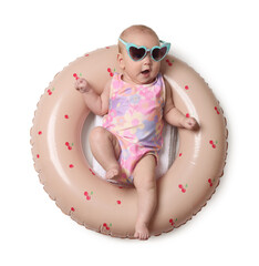 Cute little baby with sunglasses on inflatable ring against white background, top view