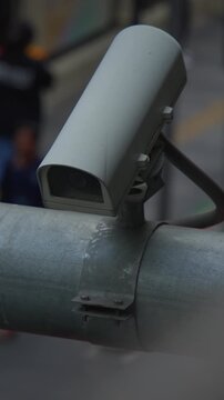 security surveillance system capturing active sidewalk activity with protective urban ambiance