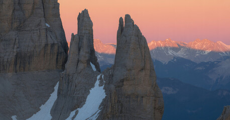 Dramatic mountain peaks at sunset rocky spires with snow a serene landscape for travel and adventure themes