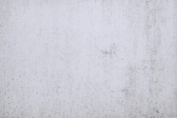 Obraz premium Elegant white concrete wall texture showcases subtle aging with stains, providing a versatile surface for design