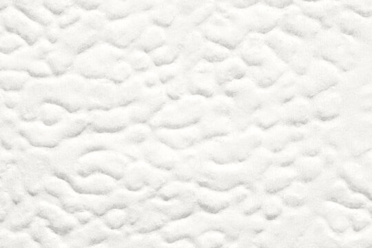 Soft white abstract textured surface with organic cloudlike pattern creating calm minimal neutral background suitable for design concepts layouts presentations and copy space