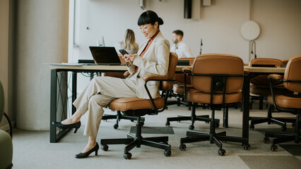 Business meeting in modern office with professionals focused on work
