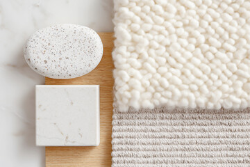 Naklejka na ściany i meble 2026 color trend. Top view flatlay moodboard featuring white materials, including a textured rug, smooth stone, and marble tile, creating a serene and minimalist aesthetic for design inspiration