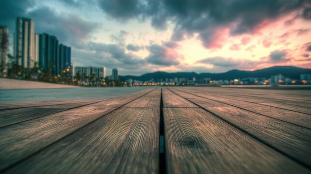 Coastal Cityscape at Dusk: Wooden Pier Leading to Urban Skyline with Dramatic Cloudy Sky