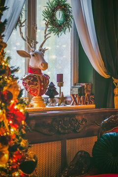 Christmas home decor, set-ups and decorations. Christmas spirit and home decor with a lot of details, in a warm and gentle light with a rich bokeh.
