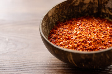 Close-Up of Local Turkish Chili Flakes in a Coconut Bowl