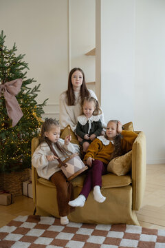 Sisters enjoying a cozy Christmas moment together
