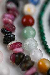 Close up of Gemstone Beads in Various Colors and Shapes