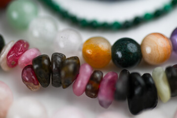 Close up of Gemstone Beads in Various Colors and Shapes