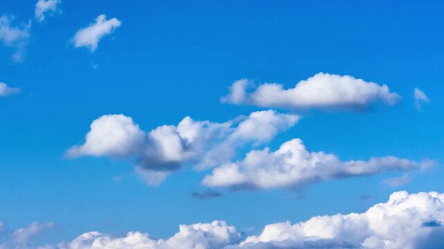 A stunning view of clouds floating in the bright blue sky. The scene is refreshing, creating a feeling of peace and freedom Stock Video