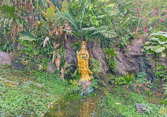 Goddess in Bangkok tropical garden, Bangkok, Thailand