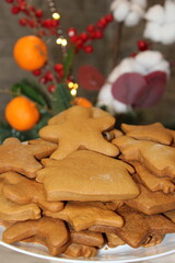Baking gingerbread cookies during holiday season with family and friends at home