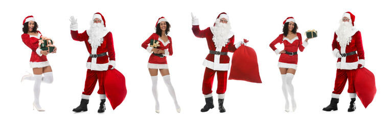Man and woman in Santa costumes on white background. Merry Christmas and Happy winter holidays