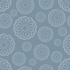Textured seamless vector pattern with intricate, soft lace flower or mandala shapes on a stylish blue-grey background. Ideal for product packaging, web backgrounds, and home decor products.