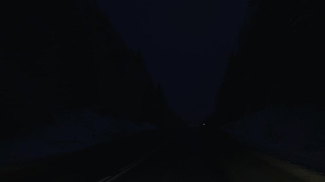 Oncoming Headlights On Dark Highway, Commuter Car Approaching Between Reflective Road Signs, Glare Bouncing