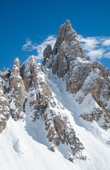 Italian Dolomites in winter with Paternkofel mountain peak on a clear crisp winter day, Sextener Dolomiten, South Tyrol, Italy