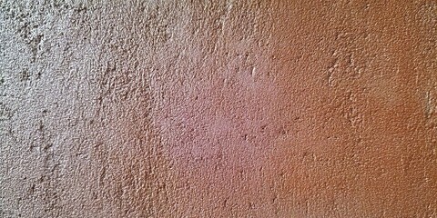 Close-up view of a textured, rough, and weathered reddish-brown wall surface.
