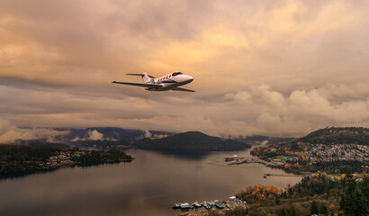 Naklejka premium Private Jet Soaring Over Sunset Mountains: A High-Flying Aerial Travel Scene