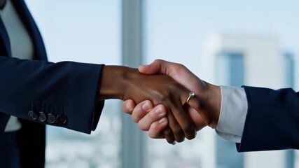 Close-up shot of a handshake between two business colleagues, symbolizing agreement and collaboration Stock Video