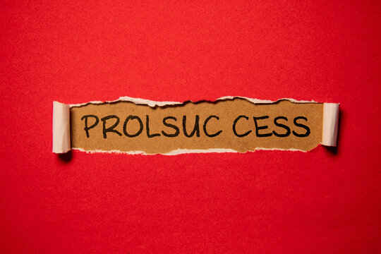 an alarm clock, a piggy bank, and a Prolsuc cess on a black sign