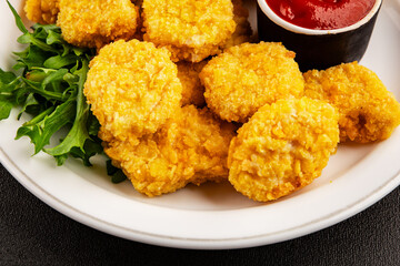 Chicken nuggets fast food natural tasty appetizer fresh delicious gourmet food background on the table rustic top view copy space