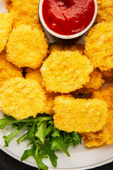 Chicken nuggets fast food natural tasty appetizer fresh delicious gourmet food background on the table rustic top view copy space