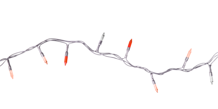 A single strand of delicate orange fairy lights on a white wire, a classic holiday decoration for festive celebrations, isolated on a transparent background.