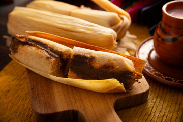 Tamales. Traditional dish typical of Mexico and some Latin American countries. Corn dough wrapped in corn leaves. The tamales are steamed.