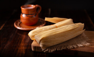 Tamales. Traditional dish typical of Mexico and some Latin American countries. Corn dough wrapped in corn leaves. The tamales are steamed.
