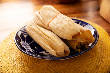 Tamales. Traditional dish typical of Mexico and some Latin American countries. Corn dough wrapped in corn leaves. The tamales are steamed.