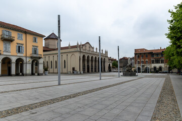A wide view of Piazza Duomo in Biella, the historic heart of the city. In the center of the square stands the Cathedral of Santo Stefano.