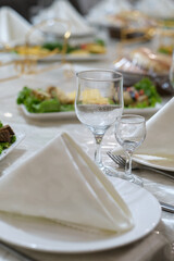 Table set for wedding or another catered event dinner.