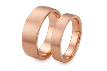 Pair of modern rose gold wedding rings with a subtle brushed texture, representing eternal love and matrimonial commitment