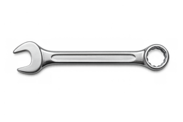 Chrome combination wrench laying on horizontal surface, displaying mechanical repair and maintenance tools