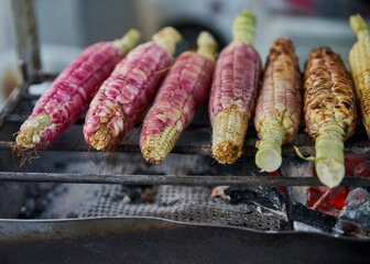 roasted corn prepared in a street stall