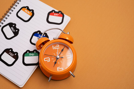 Alarm clock with day stickers. Time management and scheduling. - Powered by Adobe